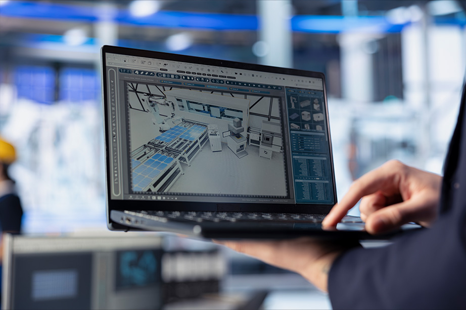 DVB solar-panels-plant-worker-analyzing-performance-data-laptop-close-up